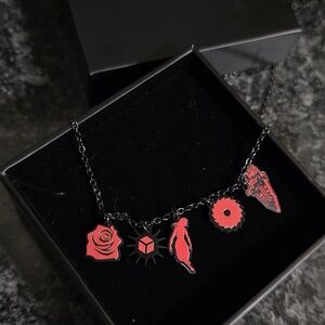 Elegant Black and Red Charm Necklace